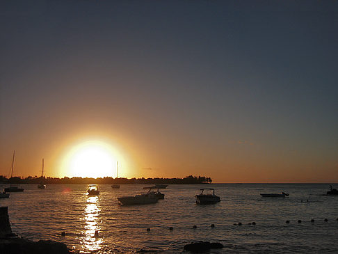 Foto Strand mit Sonnenuntergang - 