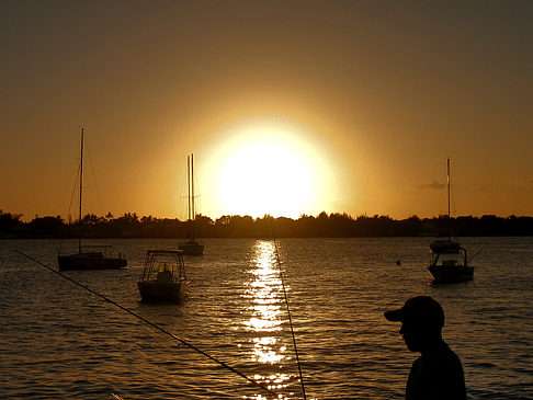 Foto Strand mit Sonnenuntergang - 