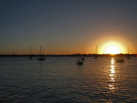 Strand mit Sonnenuntergang Foto 