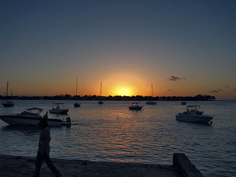 Foto Strand mit Sonnenuntergang - 