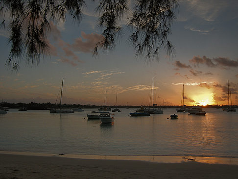 Foto Strand mit Sonnenuntergang - 