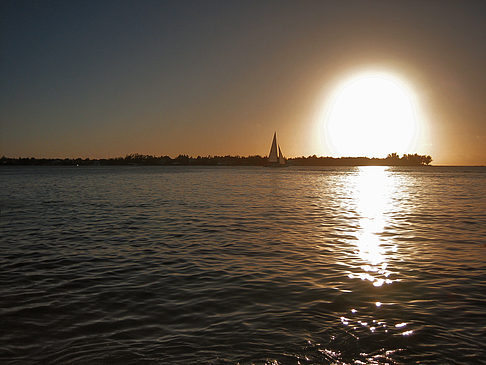 Foto Strand mit Sonnenuntergang